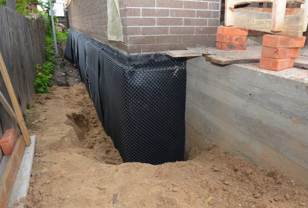 SJ Waterproofing Pros technician performing targeted Waterproofing assessment in Emerson, GA